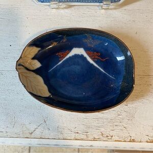 Asian motif trinket dish eggplant shape, small chip as shown